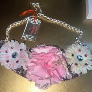 Statement necklace.  white and pink flower on black/pink lace glitter